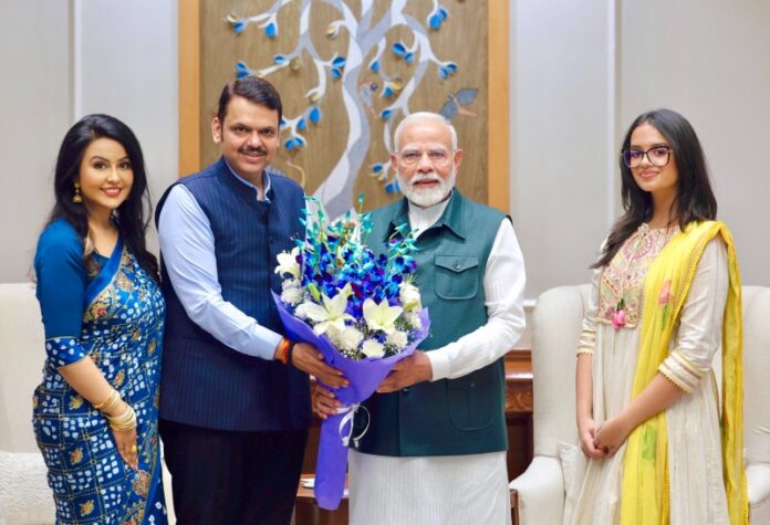 Delhi: Maharashtra Deputy CM Devendra Fadnavis meets PM Modi along with family