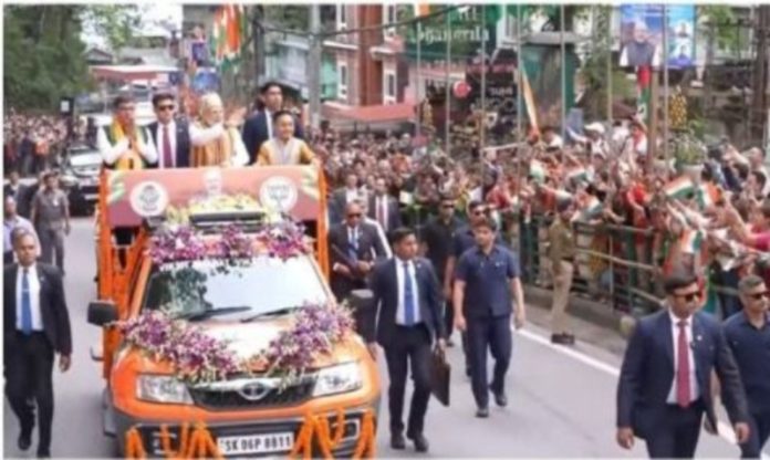 PM Modi greets people with folded hands in roadshow at Gangtok